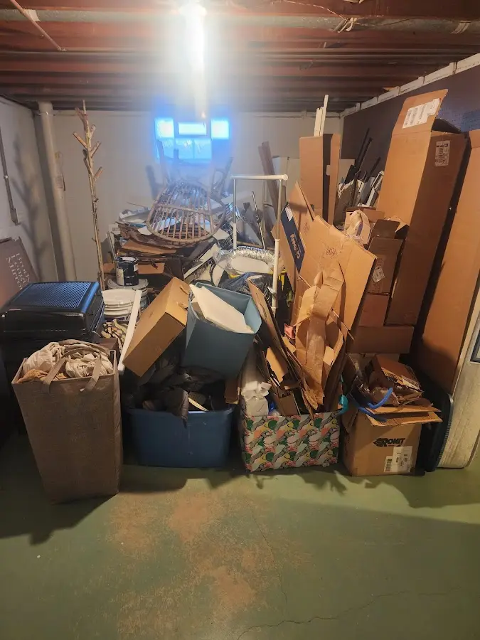 Roll-off dumpster container at job site for 15 Yard Dumpster Rental in Martinsville